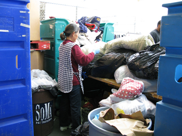 sorting clothing donations at Goodwill Industries in San Francisco
