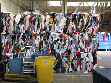 bales of clothing are ready for the scrap/rag trade